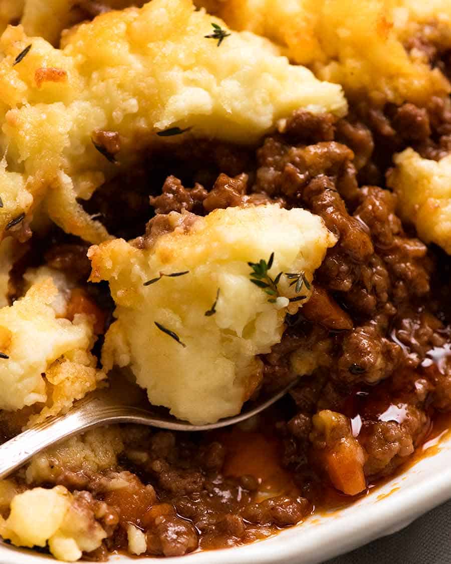 Close up of spoon scooping up Cottage Pie
