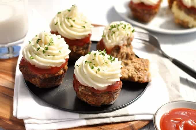 Meatloaf Cupcakes with Mashed Potato topping on a grey tray, ready to be served.