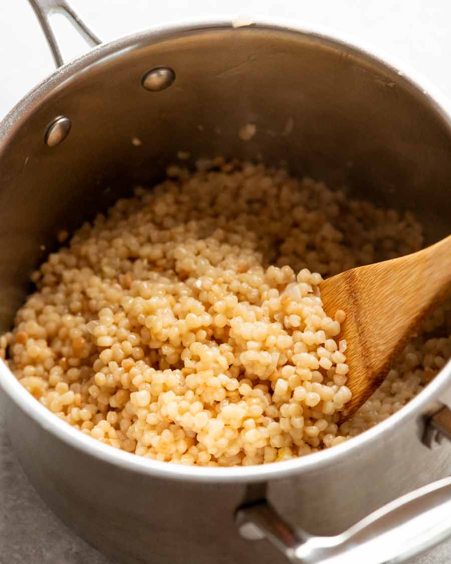 Cooked pearl couscous in a saucepan